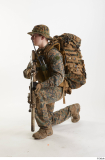 Photos Casey Schneider Trooper Pose 3 holding gun kneeling whole…